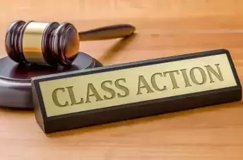 Doximity class action lawsuit: A gavel and a name plate with the engraving Class action
